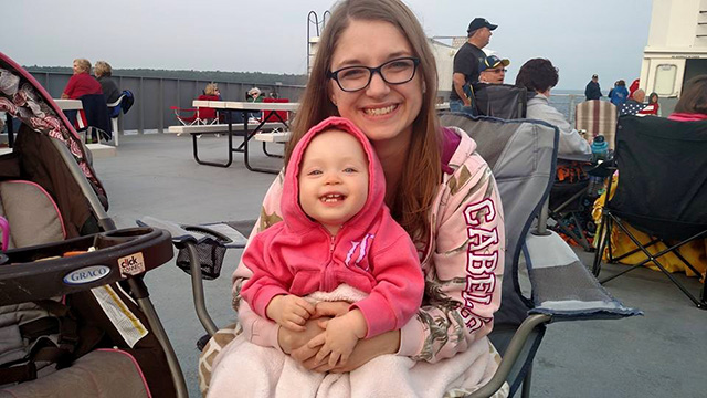 Arie with her mom on boat for fireworks cruise